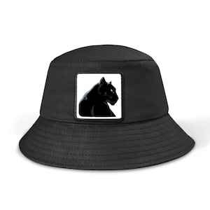 May include: Black bucket hat with a black panther silhouette patch on the front. The panther has yellow eyes.