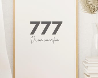 Könnte beinhalten: Ein gerahmter Druck mit der Zahl 777 und dem Text "Divine connection" im minimalistischen Stil. Der Druck ist in einem hellen Holzrahmen und hängt an einer weißen Wand.
