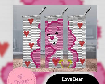 May include: A pink and white 20oz skinny tumbler with a pixelated design of a bear holding a heart. The tumbler is decorated with pink hearts and the text "Love Bear 4mm/SS16 200z Skinny Tumbler".