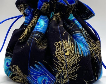 Tatting Bag #315. Peacock feathers on black background.  Gold highlights.  Bella Azure lining and blue drawstrings.