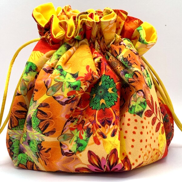 Tatting Bag #259. VERY BRIGHT.  Florence Floral Flourish on pineapple background.  Kona duckling lining and golden drawstrings.