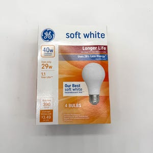 May include: A package of GE soft white light bulbs. The box features a white light bulb graphic and text indicating 4 bulbs, 40W incandescent replacement, and 29W usage. The packaging also highlights longer life and energy-saving features.