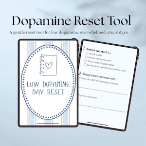 May include: Two digital tablets displaying a "Dopamine Reset Tool." One tablet shows a notebook with a heart and the text "Low Dopamine Day Reset." The other tablet has a checklist and prompts for a daily routine.