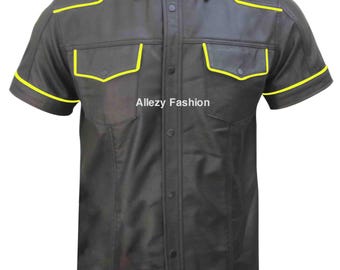 May include: A short-sleeved black shirt with yellow trim around the collar, epaulets, pockets, and sleeves. The shirt has two chest pockets and a button-up front. The text "Allezzy Fashion" is visible on the lower right side of the shirt.