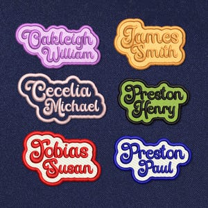 May include: Six embroidered patches with names and last names in a retro font style. The patches are in different colors: purple, yellow, pink, green, red, and blue.
