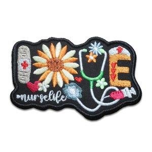 May include: Embroidered iron-on patch with the word "LOVE" spelled out with medical symbols and the words "nurselife" below. The patch features a stethoscope, a bandage, a syringe, and a flower.