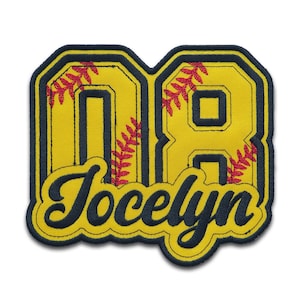 May include: Yellow and navy blue softball jersey patch with the number 18 and the name Jocelyn in a cursive font.