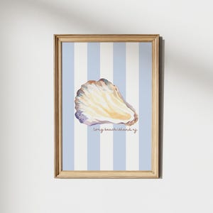 May include: A watercolor painting of an oyster shell on a blue and white striped background. The text "long beach island, nj" is written below the shell.