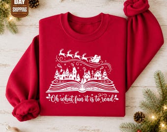 „Oh, wie viel Spaß es macht zu lesen“-Sweatshirt, Weihnachtspullover mit Weihnachtsmannschlitten, Weihnachtspullover für Bücherliebhaber, Weihnachtspullover mit Dorfmotiv, Weihnachtsgeschenk