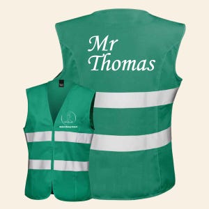 May include: Green safety vest with reflective stripes and a white embroidered logo that says "Medical Massage Network". The back of the vest has the name "Mr Thomas" embroidered in white.