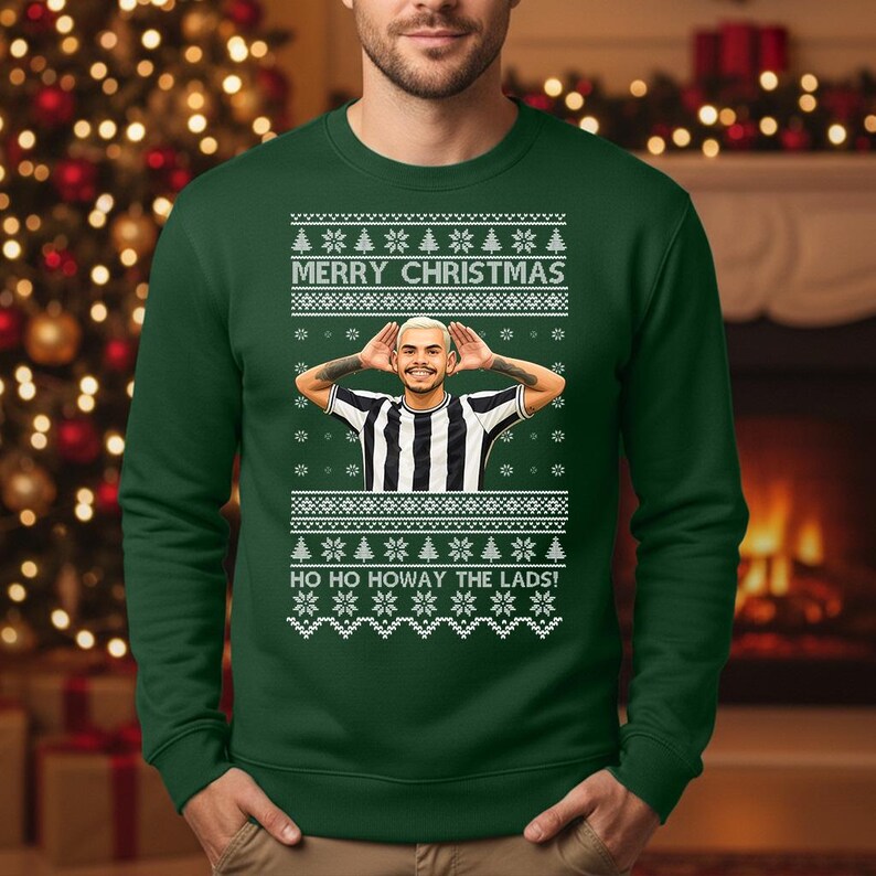 May include: Green Christmas sweater with the text "MERRY CHRISTMAS" and "HO HO HOWAY THE LADS!". The sweater features a portrait of a person with their hands on their head, wearing a black and white striped shirt. White snowflake and tree patterns are also present.