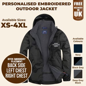 May include: Black fleece-lined jacket with a zip closure and a hood. The jacket has a text overlay that says "Your Text/Logo Here". The jacket is available in sizes XS-4XL and in colours navy, black grey, and deep grey black.