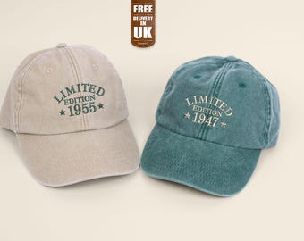May include: Two baseball caps, one beige and one teal blue, with the text "Limited Edition" and a year, 1955 and 1947, embroidered on the front.