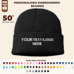 May include: Black beanie with white embroidery that says "YOUR TEXT/LOGO HERE". Available in over 50 colours.