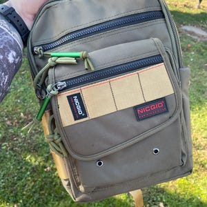 Bolso bandolera para portátil o tableta para mujer o hombre con múltiples bolsillos.