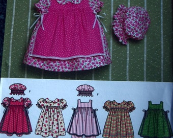 Simplicity 4709 Babie's Dress, Pinafore, Pantaloons, Panites and Hat (uncut) sizes XXS-L