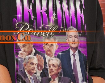 May include: Black unisex t-shirt featuring a graphic of Jerome Powell with the text "Jerome Powell" in a purple and silver design. The shirt also includes the text "Gnox Co".