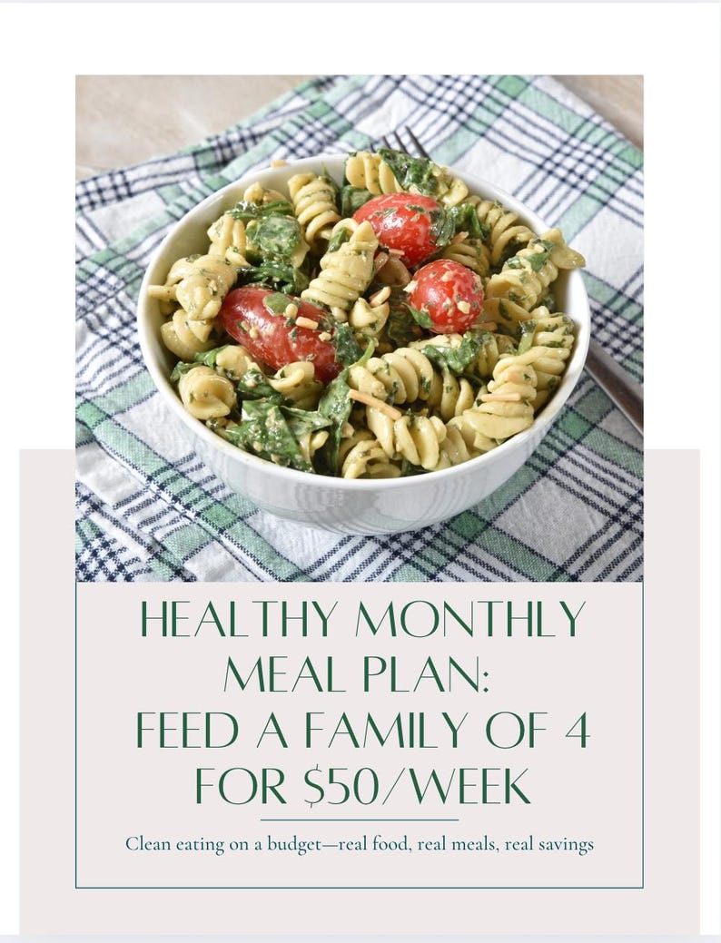 May include: A white bowl filled with pasta salad, featuring spiral pasta, spinach, and cherry tomatoes. The bowl sits on a green and white checkered cloth. Text reads: Healthy Monthly Meal Plan: Feed a Family of 4 for $50/Week.