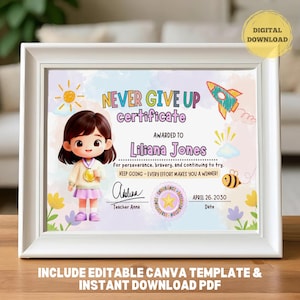 May include: A framed certificate with the words "NEVER GIVE UP" and a cartoon illustration of a girl holding a medal. The certificate is awarded to Liliana Jones and includes the text "KEEP GOING - EVERY EFFORT MAKES YOU A WINNER!"
