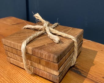 Handmade English Oak coasters, 4 per set. Finished in natural oil and bound with string.