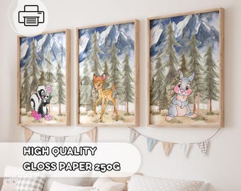 May include: Three framed prints with watercolor illustrations of woodland animals. The prints feature a deer, a rabbit, and a skunk. The background is a blue and green watercolor depiction of a forest.