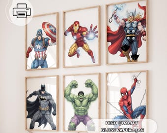 May include: Six framed superhero art prints. Captain America, Iron Man, Thor, Batman, Hulk, and Spider-Man are depicted in vibrant colors. The prints are displayed on a white wall. The text "HIGH QUALITY GLOSS PAPER 250G" is visible at the bottom.