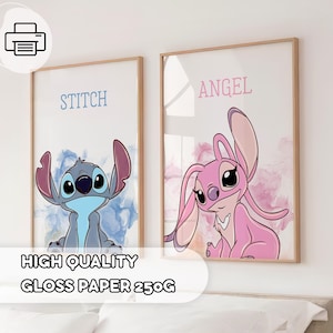 May include: Two framed art prints featuring cartoon characters Stitch and Angel. Stitch is blue with large ears, and Angel is pink. The prints have a watercolor background and the words "Stitch" and "Angel" above the characters. The text "HIGH QUALITY GLOSS PAPER 250G" is at the bottom.