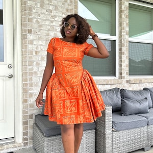 Handmade Orange Adire Dress – African Print Fit and Flare Dress with Short Sleeves | Bold Adire-Inspired Batik Dress, Adire summer dress