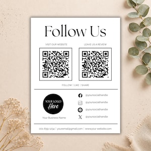 May include: A white business card with the words "Follow Us" in a bold, black font. It includes two QR codes, social media icons, and contact information. The card also features a space for a logo and business name.