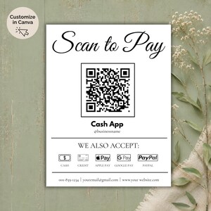 以下が含まれることがあります： エレガントな筆記体で「Scan to Pay」と書かれた白い看板。QRコード、Cash Appのロゴ、および受け入れられる支払い方法のアイコン（現金、クレジット、Apple Pay、Google Pay、PayPal）が表示されています。連絡先情報は以下に記載されています。
