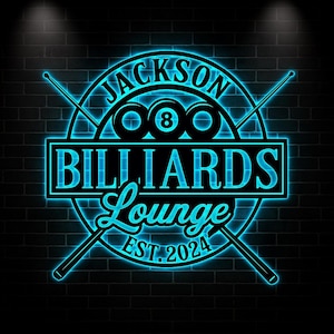 May include: A neon sign for "Jackson Billiards Lounge" against a dark brick wall. The sign features a circular design with the name, pool balls, and crossed cues. The text "EST. 2024" is also included.