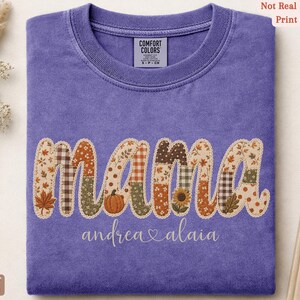 Personalized Mama Comfort Colors shirt with custom kids names, fall patchwork letters, pumpkins, florals, and faux embroidery effect in warm autumn tones on a violet tee.
