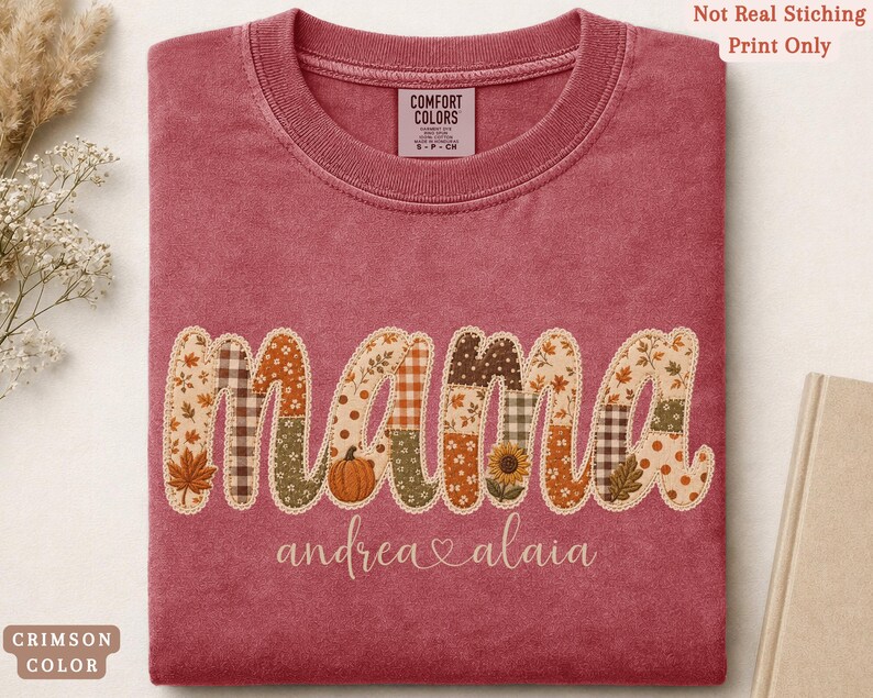 Personalized Mama Comfort Colors shirt with custom kids names, fall patchwork letters, pumpkins, florals, and faux embroidery effect in warm autumn tones on a crimson tee.
