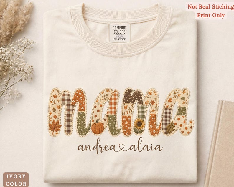 Personalized Mama Comfort Colors shirt with custom kids names, fall patchwork letters, pumpkins, florals, and faux embroidery effect in warm autumn tones on an ivory tee.