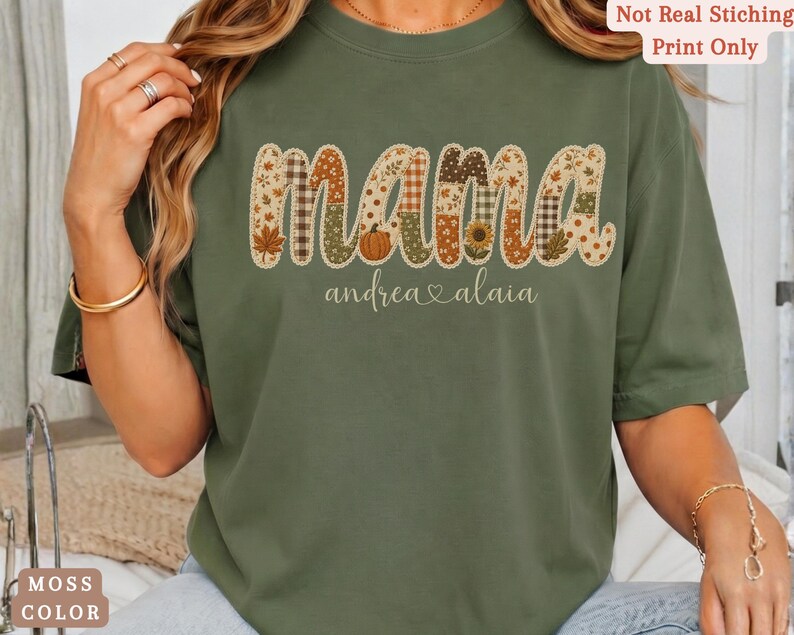 Personalized Mama Comfort Colors shirt with custom kids names, fall patchwork letters, pumpkins, florals, and faux embroidery effect in warm autumn tones on a moss tee.