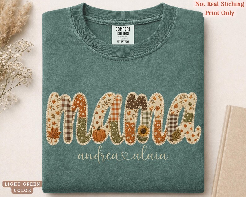 Personalized Mama Comfort Colors shirt with custom kids names, fall patchwork letters, pumpkins, florals, and faux embroidery effect in warm autumn tones on a light green tee.
