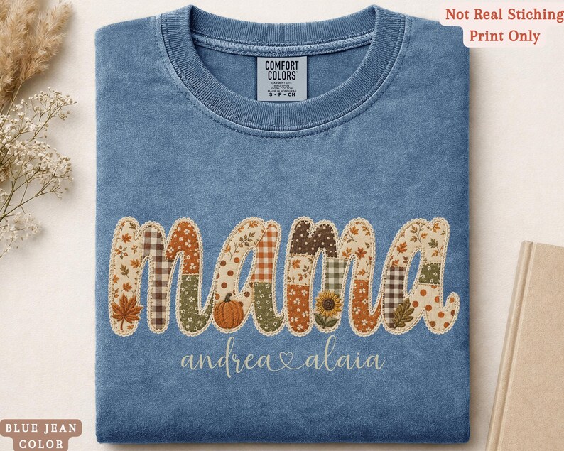 Personalized Mama Comfort Colors shirt with custom kids names, fall patchwork letters, pumpkins, florals, and faux embroidery effect in warm autumn tones on a blue jean tee.