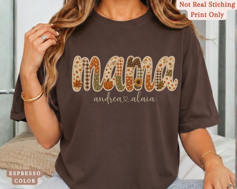 Personalized Mama Comfort Colors shirt with custom kids names, fall patchwork letters, pumpkins, florals, and faux embroidery effect in warm autumn tones on an espresso tee.