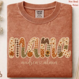 Personalized Mama Comfort Colors shirt with custom kids names, fall patchwork letters, pumpkins, florals, and faux embroidery effect in warm autumn tones on a yam tee.