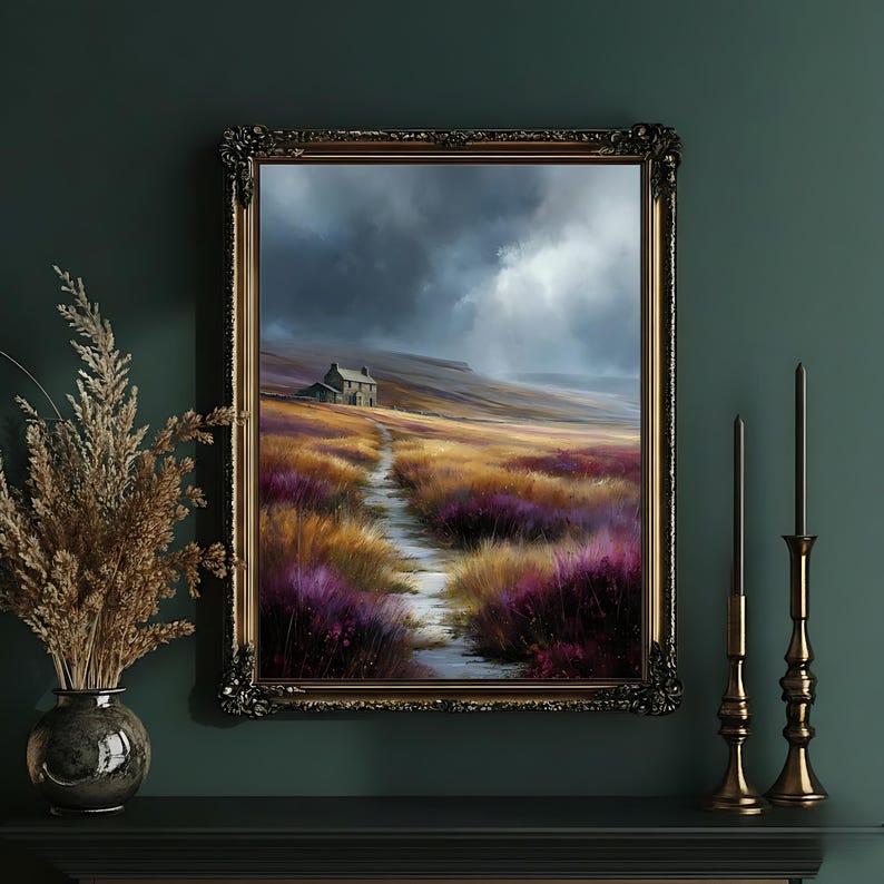 May include: A framed landscape painting depicts a path leading to a small house on a hill under a stormy sky. The path winds through fields of purple and gold flowers. The ornate gold frame adds a touch of elegance to the artwork.