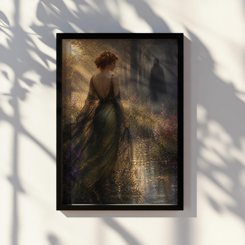 May include: A framed art print depicts a woman in an elegant green gown, walking in a sunlit forest. The artwork features a dark-haired figure in the background, with a stream and colorful flowers. The print is in a black frame.