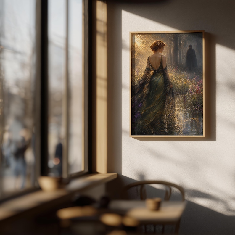 May include: A framed art print depicts a woman in a flowing green gown, facing away from the viewer, with a figure in the background. The artwork has a vintage aesthetic, with a warm color palette and a focus on light and shadow.