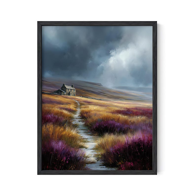 May include: A framed landscape painting depicts a stone cottage on a hillside, with a path leading through fields of purple and gold grasses. The sky is overcast with dark, dramatic clouds. The artwork is enclosed in a black frame.