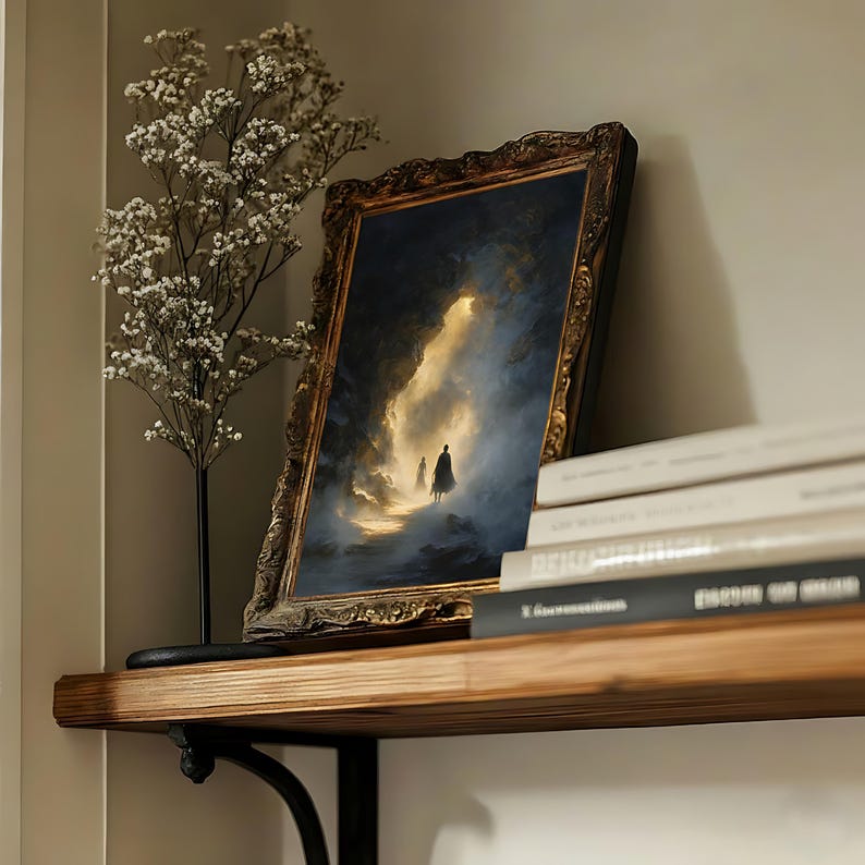 May include: An ornate framed art print depicting a figure walking towards a bright light in a dark, atmospheric scene. The frame is gold with intricate detailing. The print is displayed on a wooden shelf with books and a decorative plant.