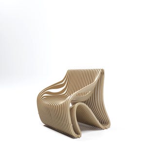 May include: A modern, sculptural chair made of light-colored wood. The chair features a unique design with curved, layered slats, creating an open and airy aesthetic. The chair's arms and back flow seamlessly, offering a stylish seating option.