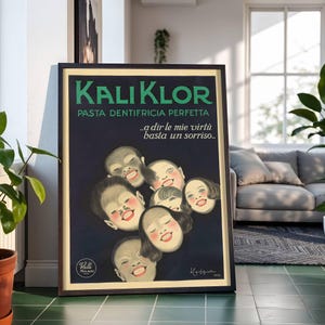 May include: Framed vintage advertisement for Kali Klor toothpaste. The poster features a dark blue background with the text "Kali Klor" in green, and illustrations of smiling faces. The text "PASTA DENTIFRICIA PERFETTA" is also visible.
