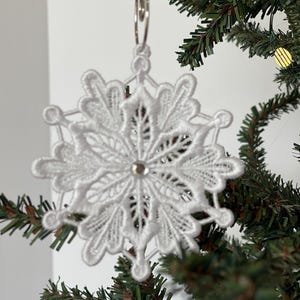 Handmade Lace Snowflake Christmas Ornament White Tree Decoration Vintage Holiday Keepsake Gift Idea Teacher Appreciation Present Winter Festive Display Elegant Home Decor Beautiful Christmas Collection Intricate Design Traditional Hanging