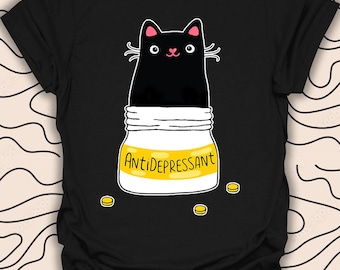 May include: Black cat cartoon illustration inside a yellow pill bottle with the word "Antidepressant" on the label.  There are yellow pills scattered around the bottle.