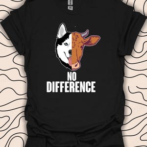 May include: Black t-shirt with a graphic of a husky dog and a cow with the text "NO DIFFERENCE" printed in white.