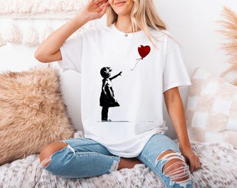 Camiseta Banksy de chica con globo, grafiti callejero, corazón y globo. Regalo unisex para hombre y mujer. 4346 piezas.